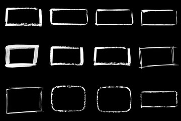 Obraz premium Sammlung von 12 weissen Rahmen auf schwarz - Pinsel Zeichnungen