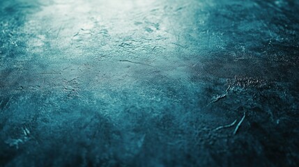 Teal textured background with dark, mottled surface.