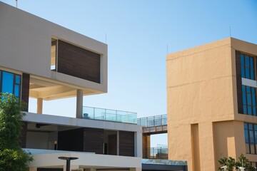 Modern commercial building with glass balconies.