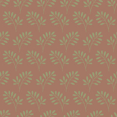 Seamless botanical pattern with green branches, leaves on a mocha mousse color background