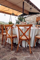 Charming outdoor dining setup with floral decor.