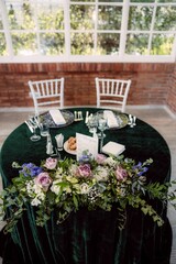 Elegant table setting with floral centerpiece.