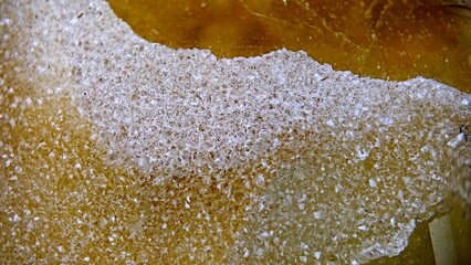 macrophotography of crystal crusts on the surface of heliodor beryl 1