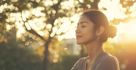 Serene woman enjoying sunset in nature, peaceful moment
