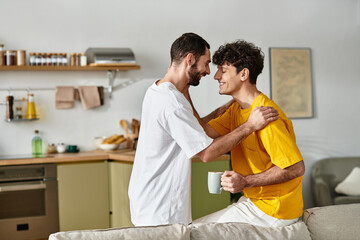 Fototapeta premium Loving moments shared by a joyful couple in their cozy modern apartment
