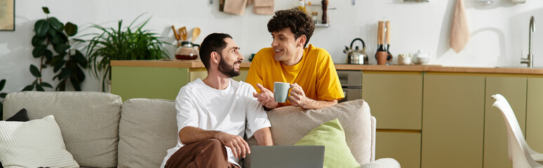 Two men enjoy a cozy moment together in their modern apartment