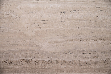 Natural travertine marble texture in warm tones