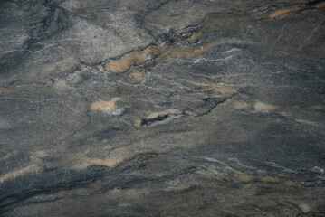 Earthy stone background with detailed striations and organic shapes