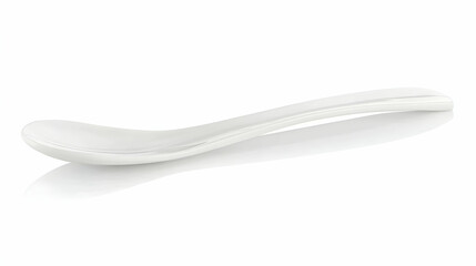 White ceramic spoon on white background, studio shot, reflection visible, for food or culinary websites.