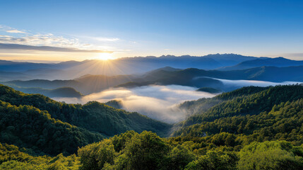 Breathtaking mountain view at sunrise with misty valleys and vibrant sky