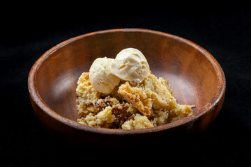 A classic spiced dessert encased in a buttery, flaky crust. Warm and cozy, with a scoop of vanilla ice cream.