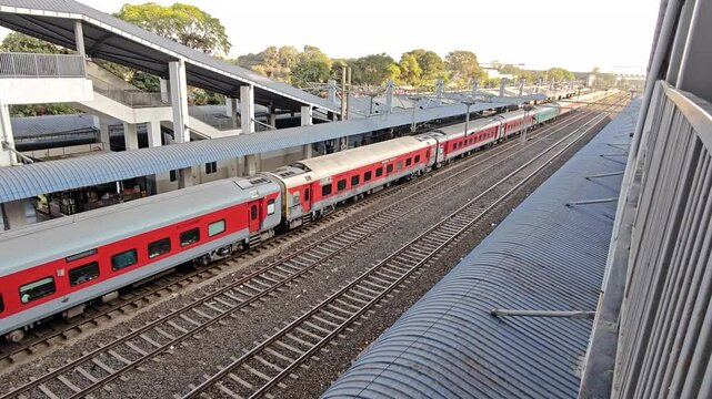 Passenger train moving through station in Bhopal