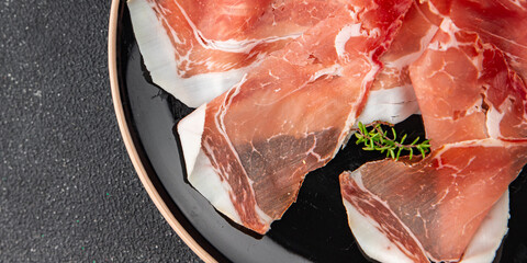 Jamon meat iberico or serrano snack aperitif fresh tasty food dish delicious gourmet food...