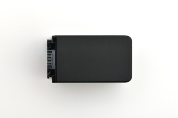 Top view extreme macro photography of Li-Ion camcorder battery isolated on white background