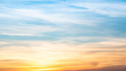 Sky,sunset, beautiful , luxury soft gradient orange gold clouds and sunlight on the blue sky perfect for the background, Sunrise on morning or everning in winter warm time ,Twilight summer,silhouette