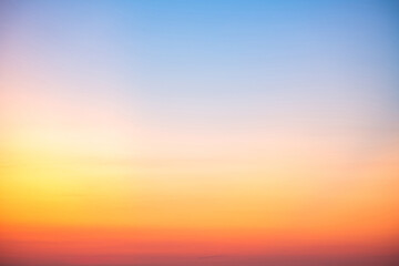 Sky,sunset, beautiful , luxury soft gradient orange gold clouds and sunlight on the blue sky perfect for the background, Sunrise on morning or everning in winter warm time ,Twilight summer,silhouette