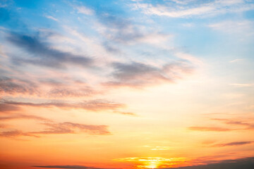 Sky,sunset, beautiful , luxury soft gradient orange gold clouds and sunlight on the blue sky perfect for the background, Sunrise on morning or everning in winter warm time ,Twilight summer,silhouette
