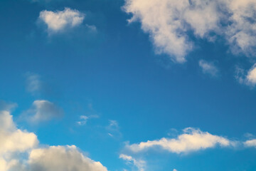 Fototapeta premium Winter blue sky and cloud. Calm clear winter air background. The sky blue texture clouds. Blue sky and White cloud nature background.
