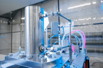 Operation of automatic machine plastic form for kit medical production. Closeup of roller blue...