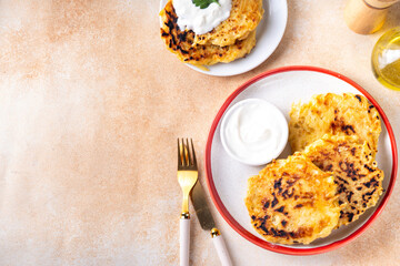 Vegetarian comfort food, potato pancakes. Traditional european vegetable dish, potato fritters,...
