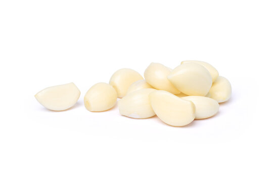 Peeled garlic clove isolated