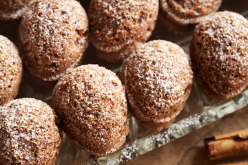 Homemade nut shaped Christmas cookies filled with cream, close up