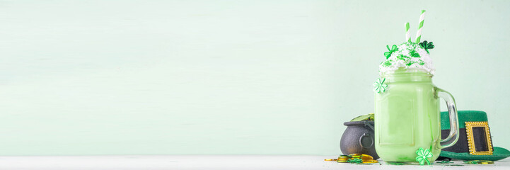 Patrick day milkshake, tasty sweet dessert shake cocktail, shamrock color milk drink for St...