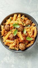 Fototapeta premium Hearty Pasta with Meatballs in a Rich Tomato Sauce