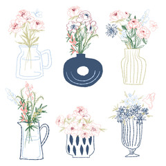 Collection of stylish flower arrangements in decorative vases. Ideal for creative projects, prints, and home decor accents
