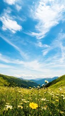 Fototapeta premium A vibrant landscape with colorful flowers in a meadow, under a bright blue sky adorned with wispy clouds, set against rolling green hills.