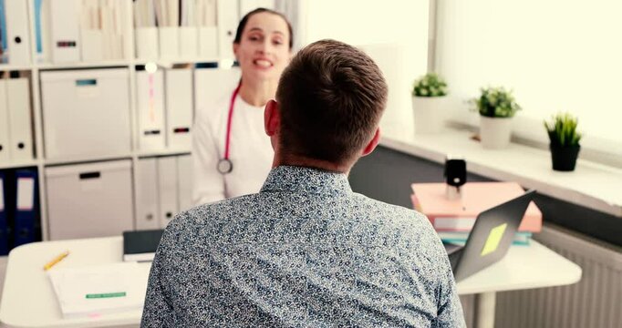 A professional doctor consults a patient in a bright, inviting office, emphasizing essential health care