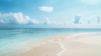 Obraz premium Tranquil Beach Scene with Gentle Waves and Blue Sky Perfect for Meditation and Yoga, Ideal Summer Vacation Setting with Space for Text