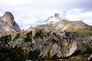 Partly snow-covered mountain landscape in the European Alps and the Italian Dolomites. Mountain...