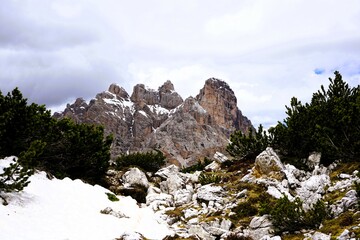 Partly snow-covered mountain landscape in the European Alps and the Italian Dolomites. Mountain...