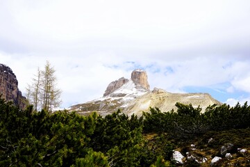 Partly snow-covered mountain landscape in the European Alps and the Italian Dolomites. Mountain...