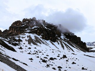 Partly snow-covered mountain landscape in the European Alps and the Italian Dolomites. Mountain...