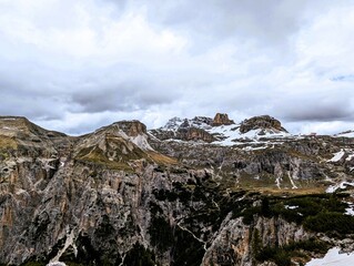 Partly snow-covered mountain landscape in the European Alps and the Italian Dolomites. Mountain...