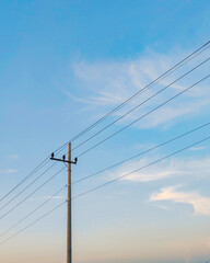Poles against clear sky