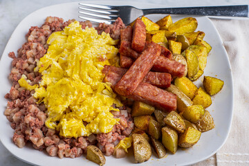 scramble eggs  with spam fries and  home fries
