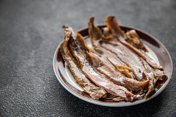 Anchovy fillet fish seafood snack aperitif fresh tasty food dish delicious gourmet food background on the table rustic food top view copy space pescetarian diet