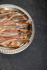 Anchovy fillet fish seafood snack aperitif fresh tasty food dish delicious gourmet food background on the table rustic food top view copy space pescetarian diet
