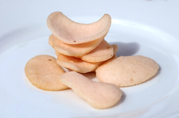 shrimp crackers Indonesian food on white plate