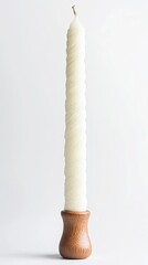 Twisted candle in wooden holder