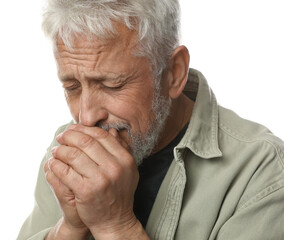 Sad senior man crying on white background