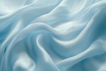 Fototapeta premium Soft Blue Silk Fabric Draped Beautifully with Gentle Waves