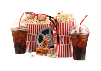Tasty popcorn, film reel, glasses, clapper, soda drinks and movie tickets isolated on white