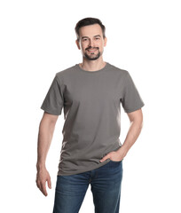 Obraz premium Man in blank grey t-shirt on white background. Mockup for design