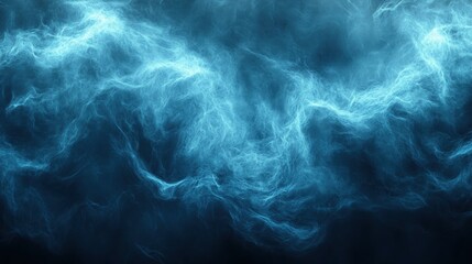 Obraz premium Ethereal Blue Smoke or Mist Flowing Across a Dark Background