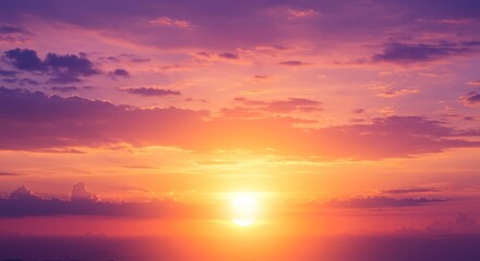 Fototapeta premium beautiful florescent sunset in the clouds of pink, orange and yellow. bright sun background, dawn or dusk, sunrise, pastel