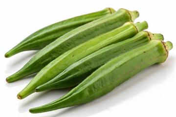 Obraz premium Fresh Green Okra Pods on White Background - Exotic and Healthy Vegetable